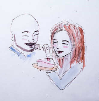 Aliya is feeding Ante a cake